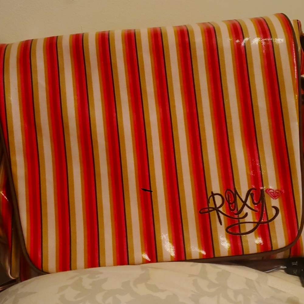 Roxy Diaper bag with changing  mat gently  used Final price